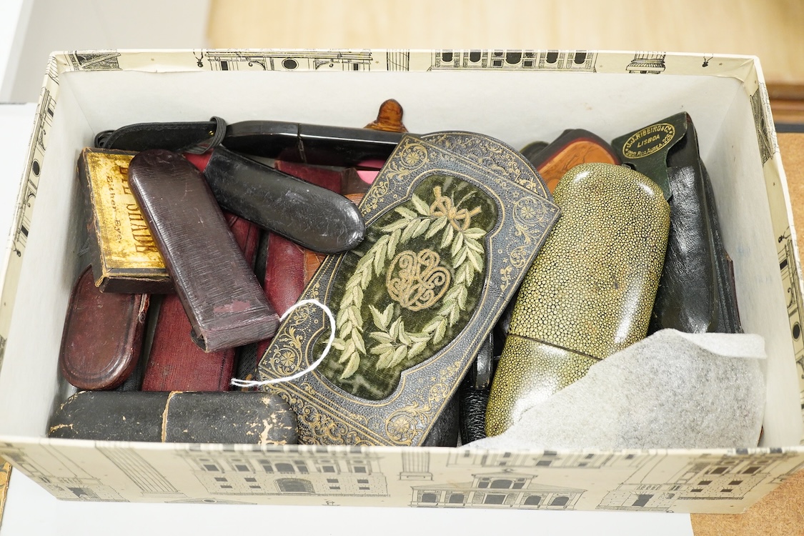 A large collection of 19th-century steel wire framed spectacles and a collection of 19th century leather, shagreen, embroidered etc. spectacle cases